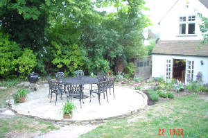 just the lawn to relay and this garden's done