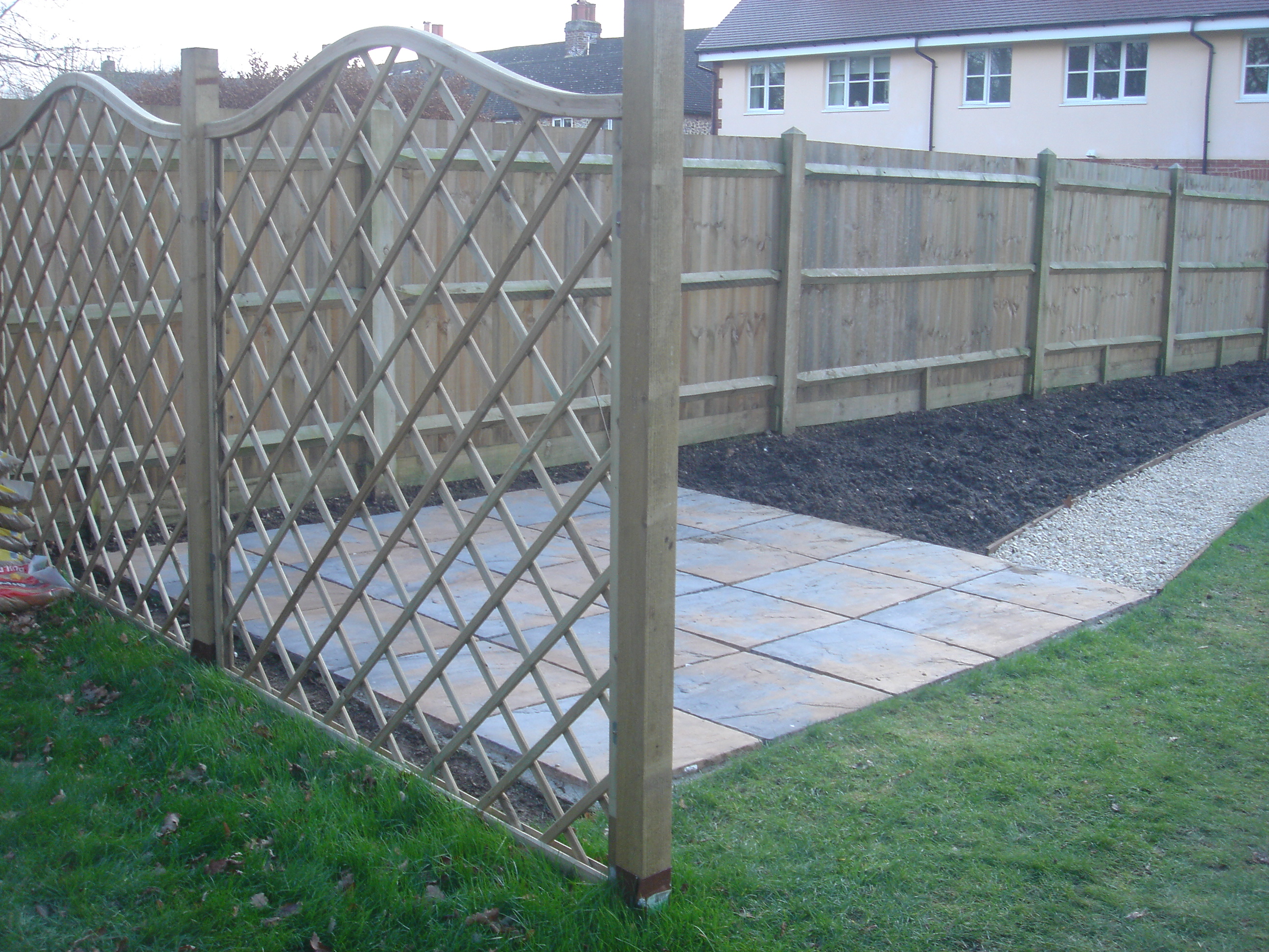 only a small patio but we did lay the lawns, paths, borders and the fence